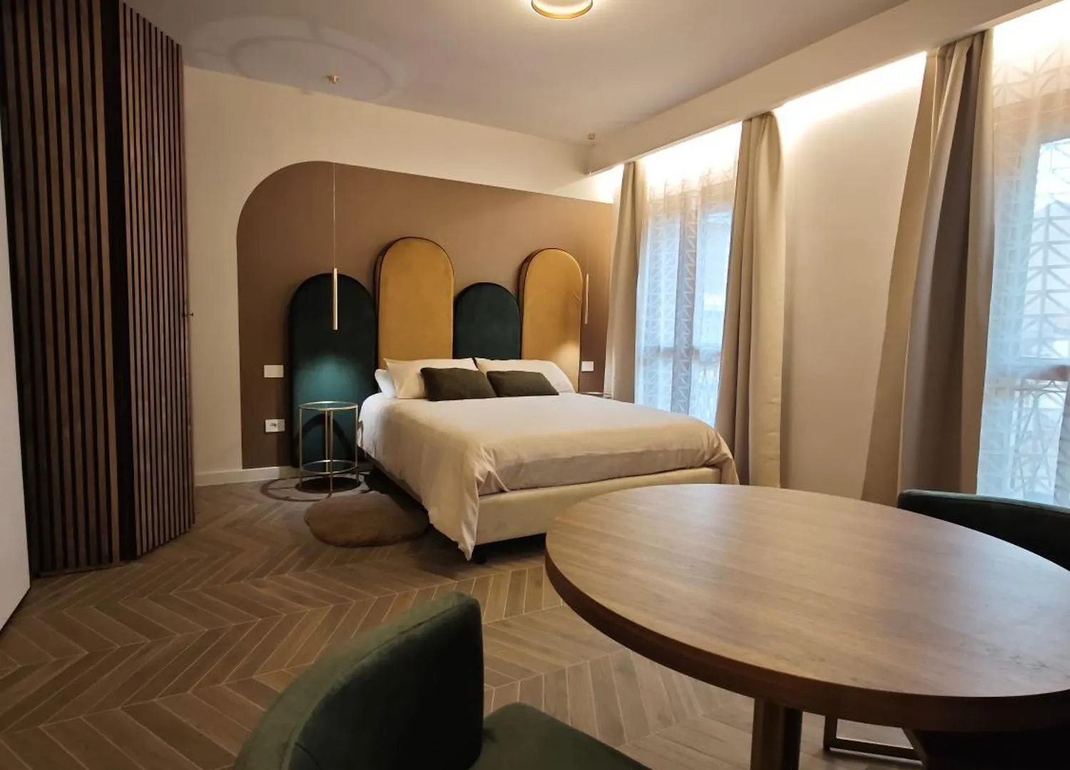Oasi City Center Luxury Apartments Кальяри