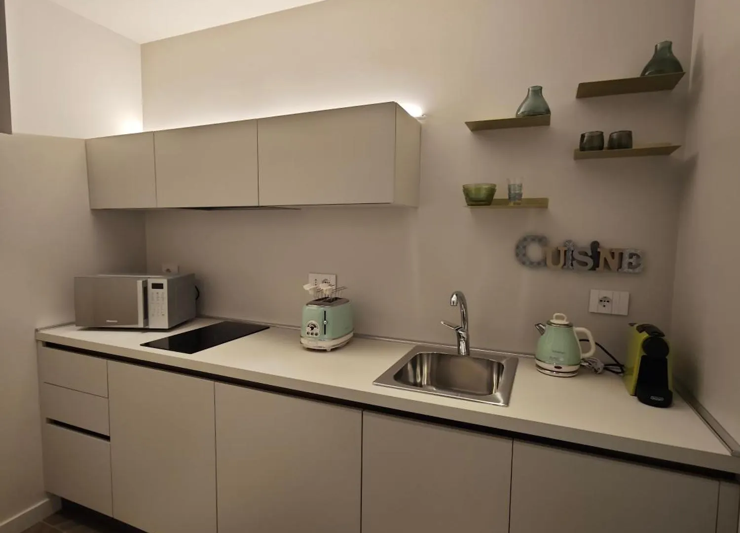 Oasi City Center Luxury Apartments Кальяри