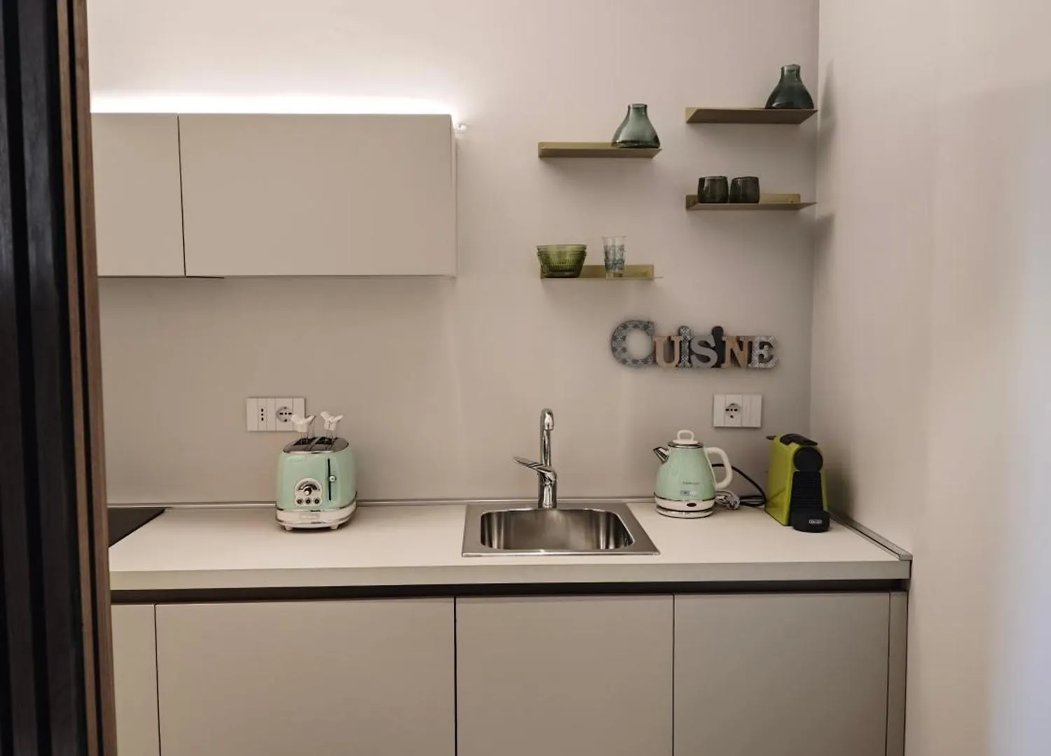 Oasi City Center Luxury Apartments Кальяри